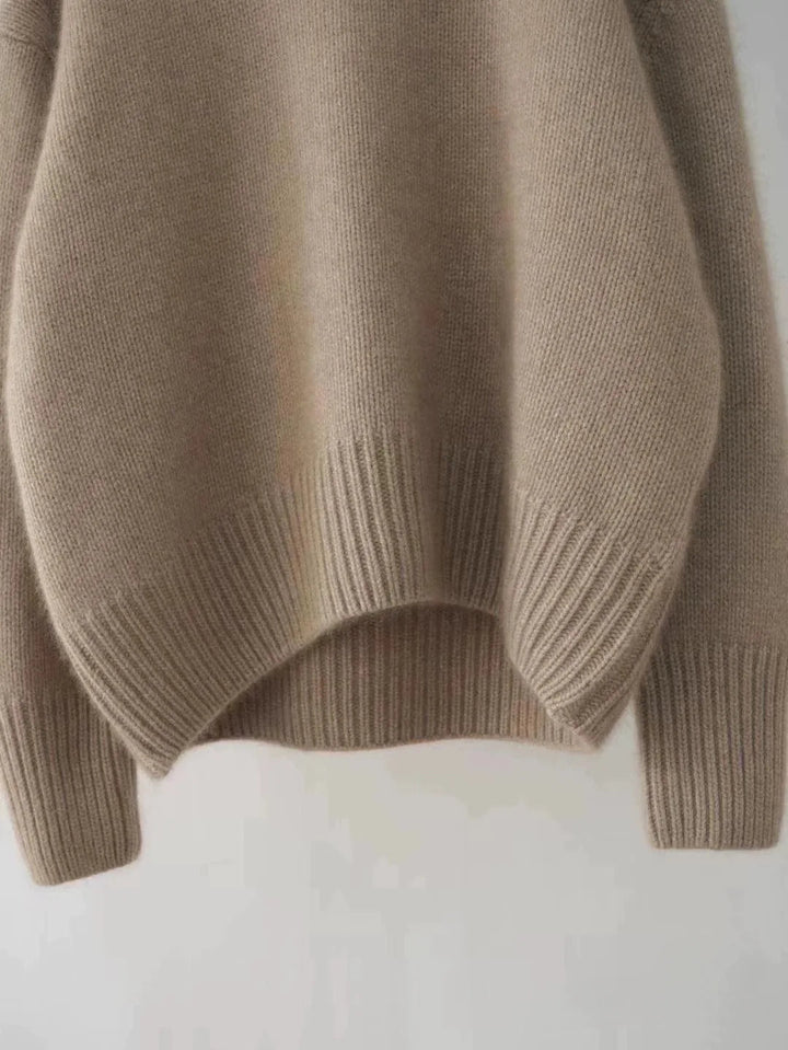 Oversized women's soft turtleneck sweater, ideal loungewear. Cozy, warm & elegant for fall/winter relaxed comfort.