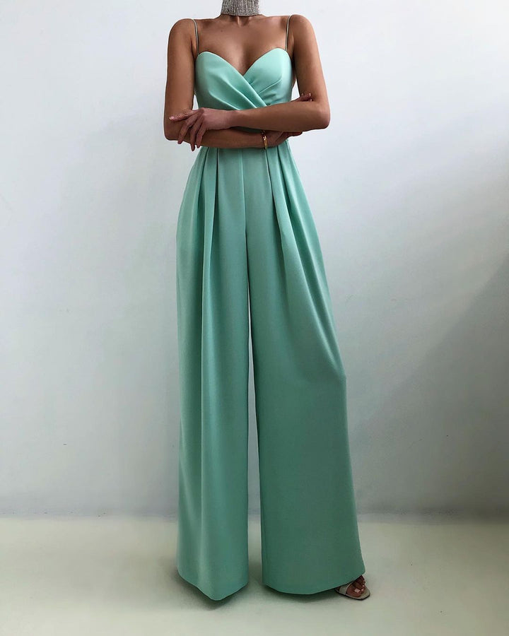 Chic women's wide-leg jumpsuit with spaghetti straps, ideal for parties & special occasions.
