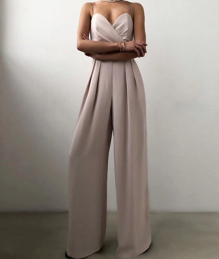 Stylish sleeveless wide-leg jumpsuit for women, featuring elegant spaghetti straps for a chic party outfit.