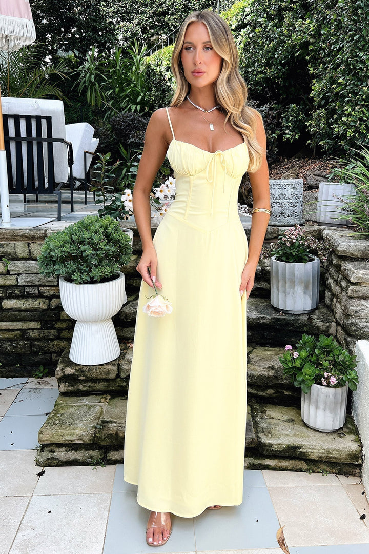 Elegant women's spaghetti strap wrap maxi dress, perfect as a formal wedding guest or party gown.