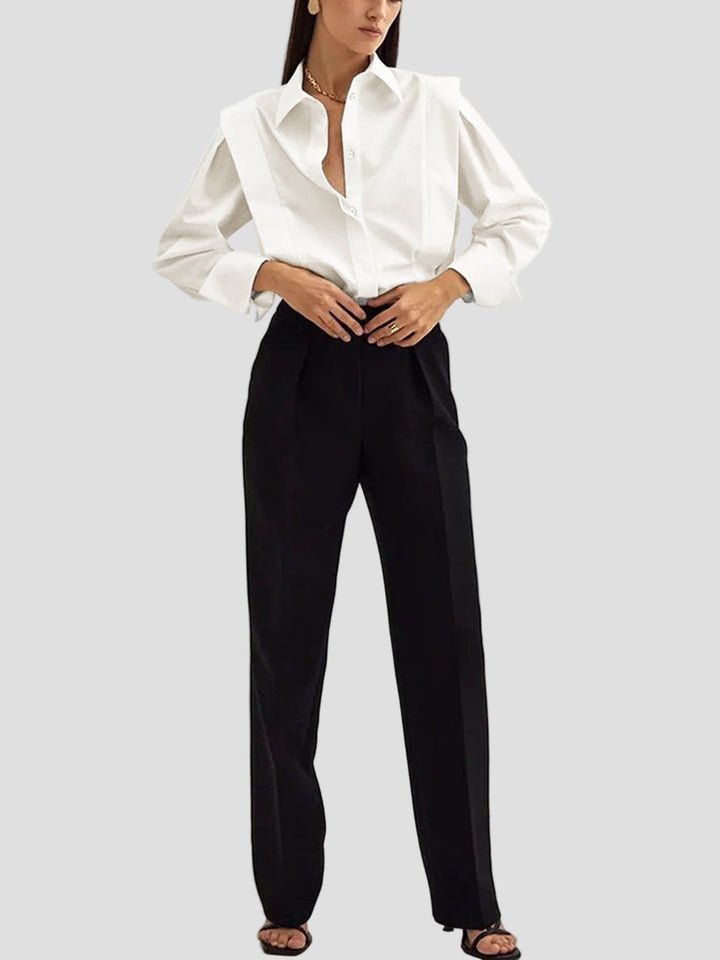 Sophisticated women's elegant blouse. Features a square neck & button-down design, perfect for work or leisure.