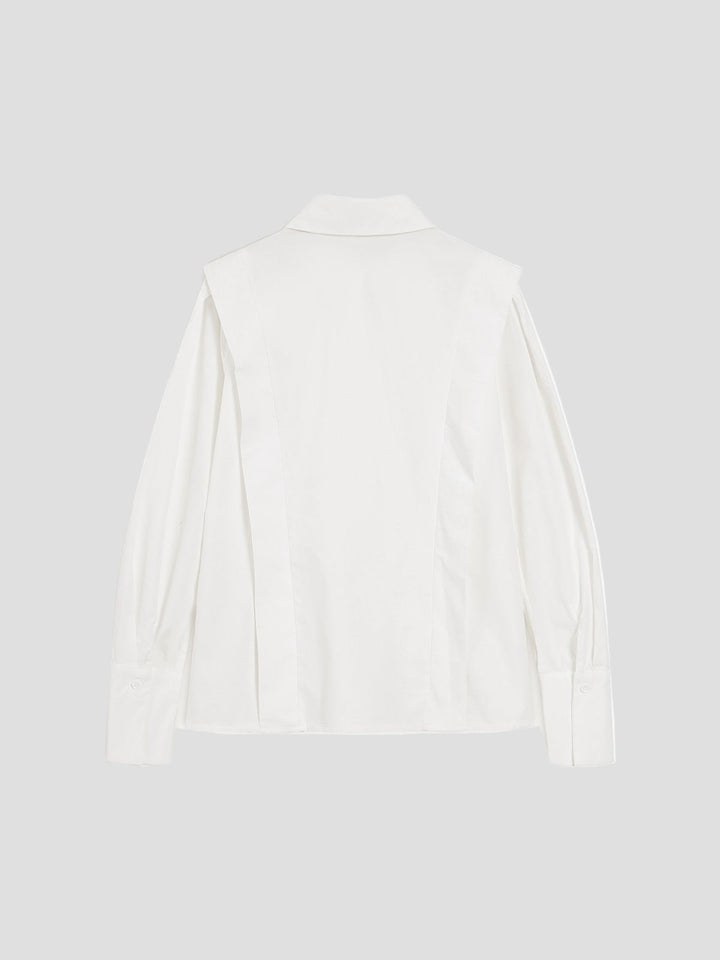 Chic women's office wear blouse. Elegant square neck, button-down front, and long sleeves for a polished look.
