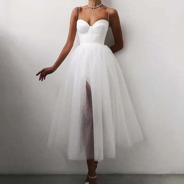 Beautiful women's strapless evening dress, a romantic flowing gown with elegant pleats for formal occasions.