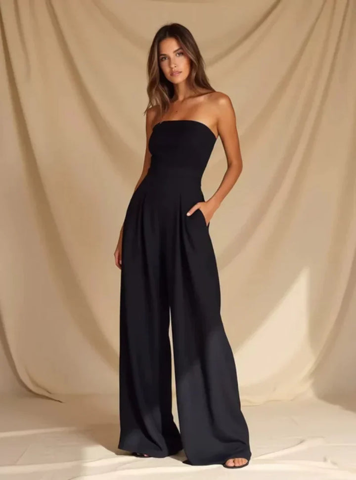 Elegant navy strapless wide-leg jumpsuit for women. Perfect for formal occasions & evening parties.