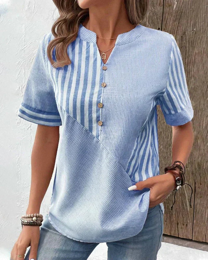 Versatile women's short sleeve striped blouse for effortless everyday style or office wear.