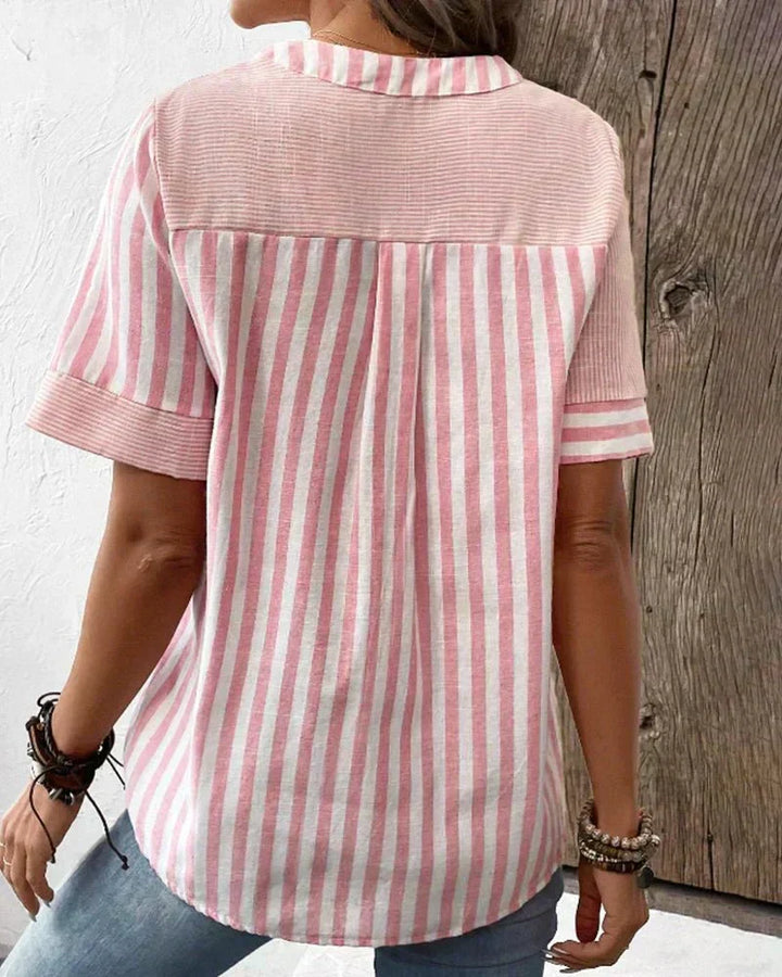 Striped short sleeve blouse for women, featuring an elegant design for casual and business looks.