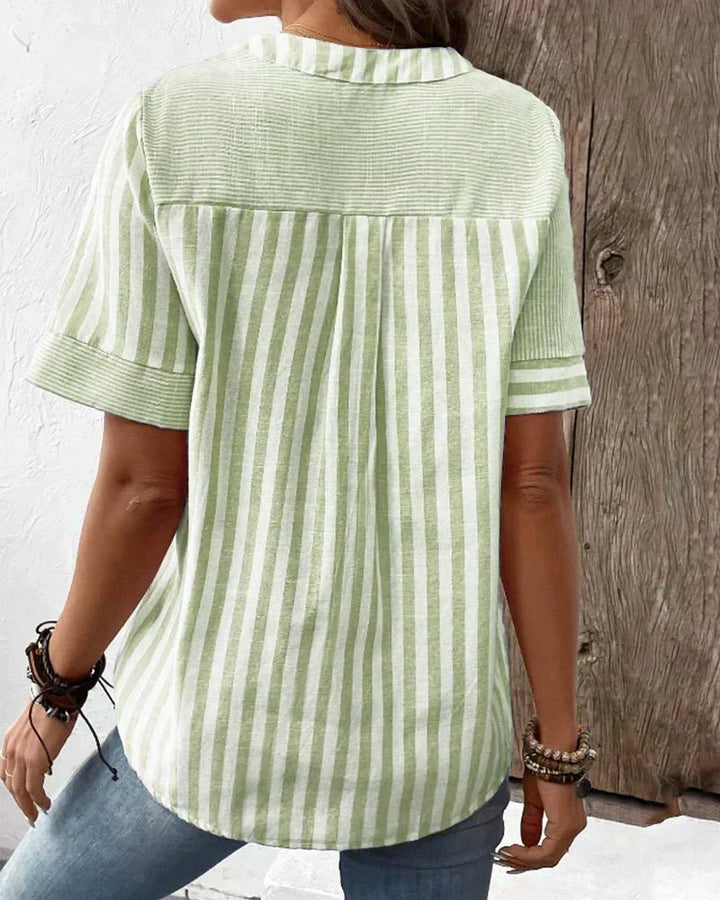 Comfortable and elegant striped women's top with short sleeves, great for daily wear or semi-formal.