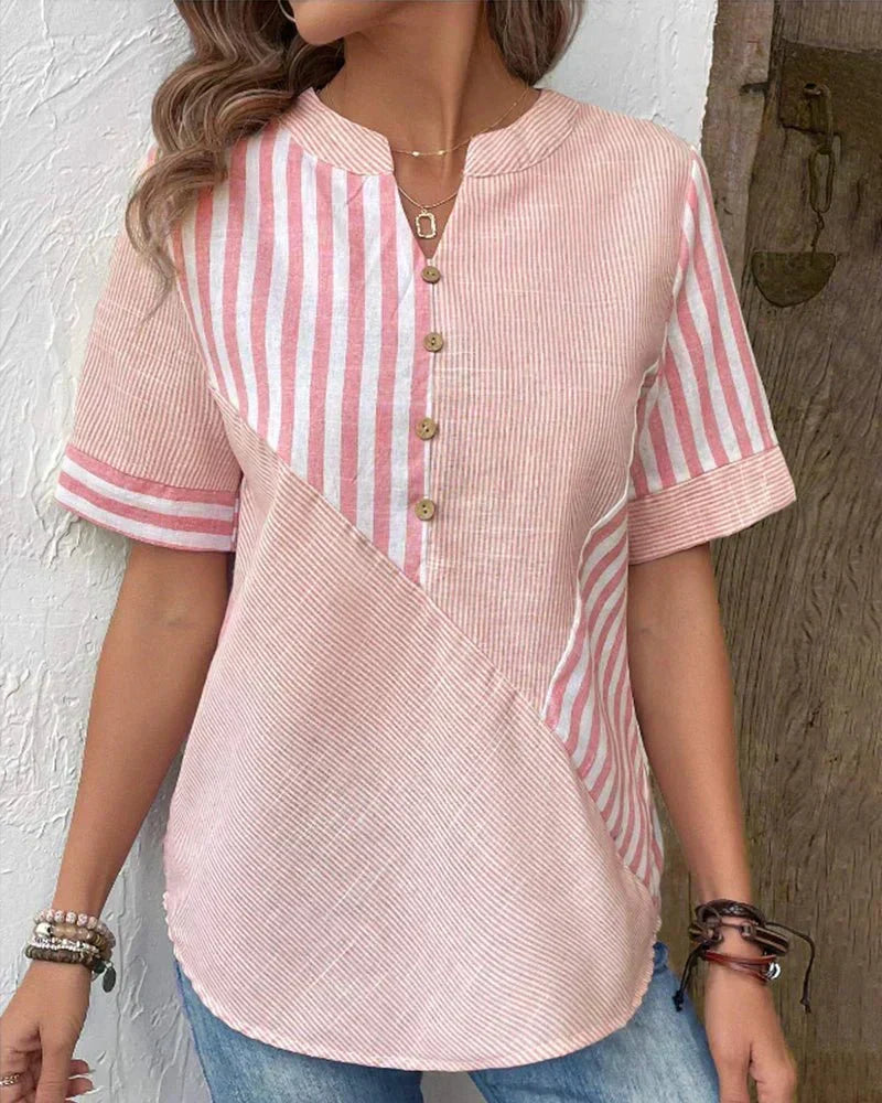 Classic striped women's short sleeve blouse with a modern, elegant design for any occasion.
