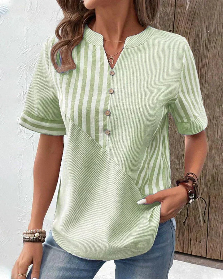 Women's elegant striped short sleeve top, a versatile blouse for casual, business, or everyday style.