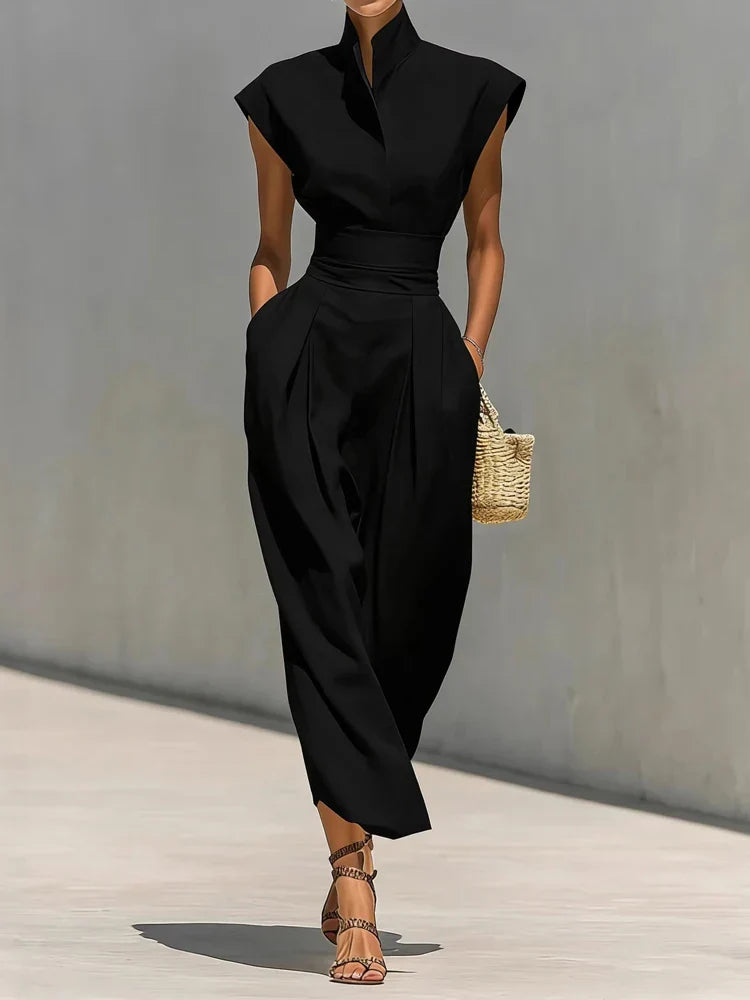 Chic women's structured midi dress with a flattering cinched waist and hidden pockets, ideal for modern office or evening.