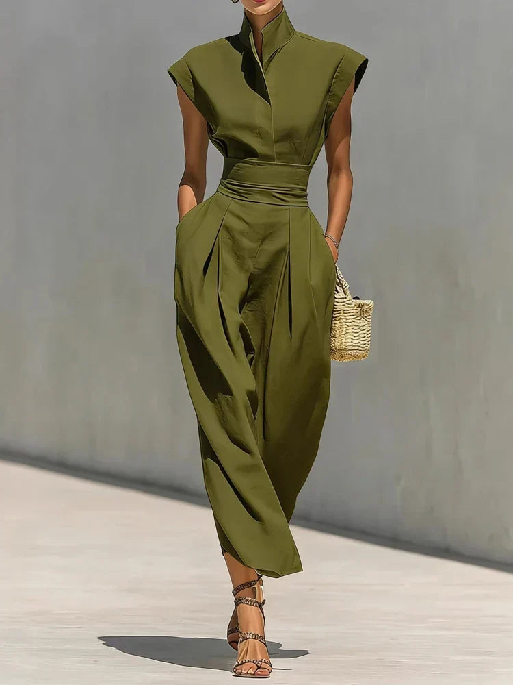 Women's fashion midi dress with a structured fit, elegant cinched waist, & chic design. Great for work or evening events.