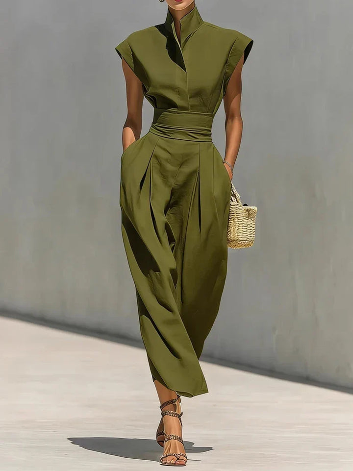 Women's fashion midi dress with a structured fit, elegant cinched waist, & chic design. Great for work or evening events.