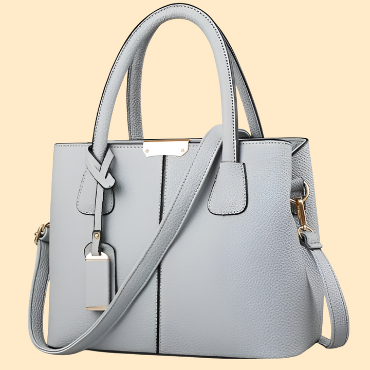 Versatile women's structured satchel handbag, ideal for professional work settings or chic daily wear.