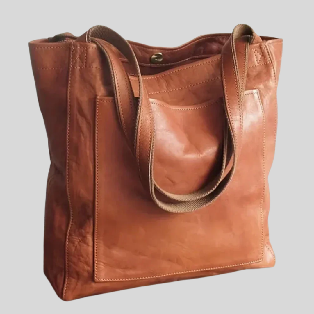 Elegant women's stylish tote bag with adjustable shoulder strap, perfect everyday fashion accessory.