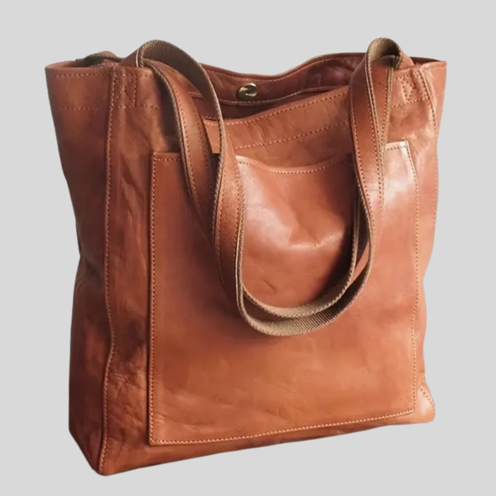 Elegant women's stylish tote bag with adjustable shoulder strap, perfect everyday fashion accessory.
