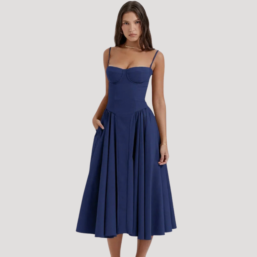 Women's midi dress featuring a sweetheart corset bodice, spaghetti straps, and a flowing A-line skirt.