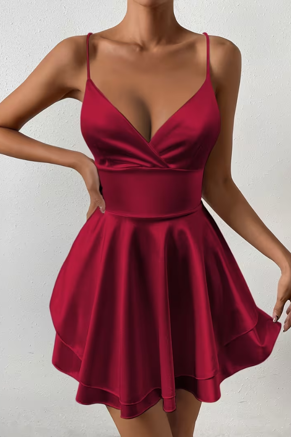 Stylish women's open back swing dress with a V-neckline & pleated skirt. Ideal for date nights & elegant parties.