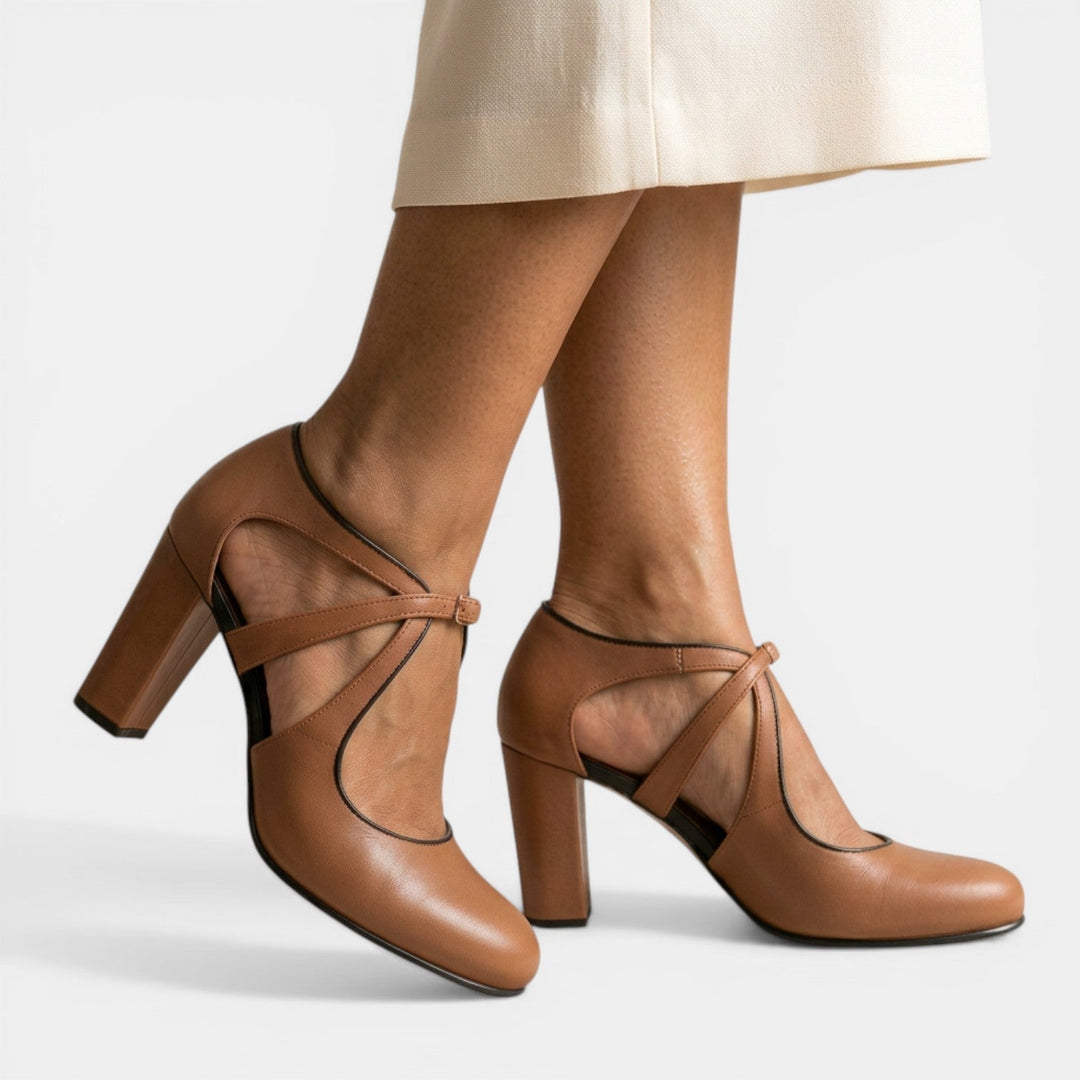 Elegant women's T-Strap high heel sandals with buckle closure, perfect for evening wear.
