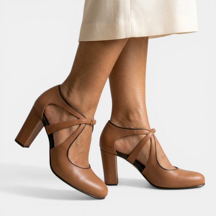 Elegant women's T-Strap high heel sandals with buckle closure, perfect for evening wear.