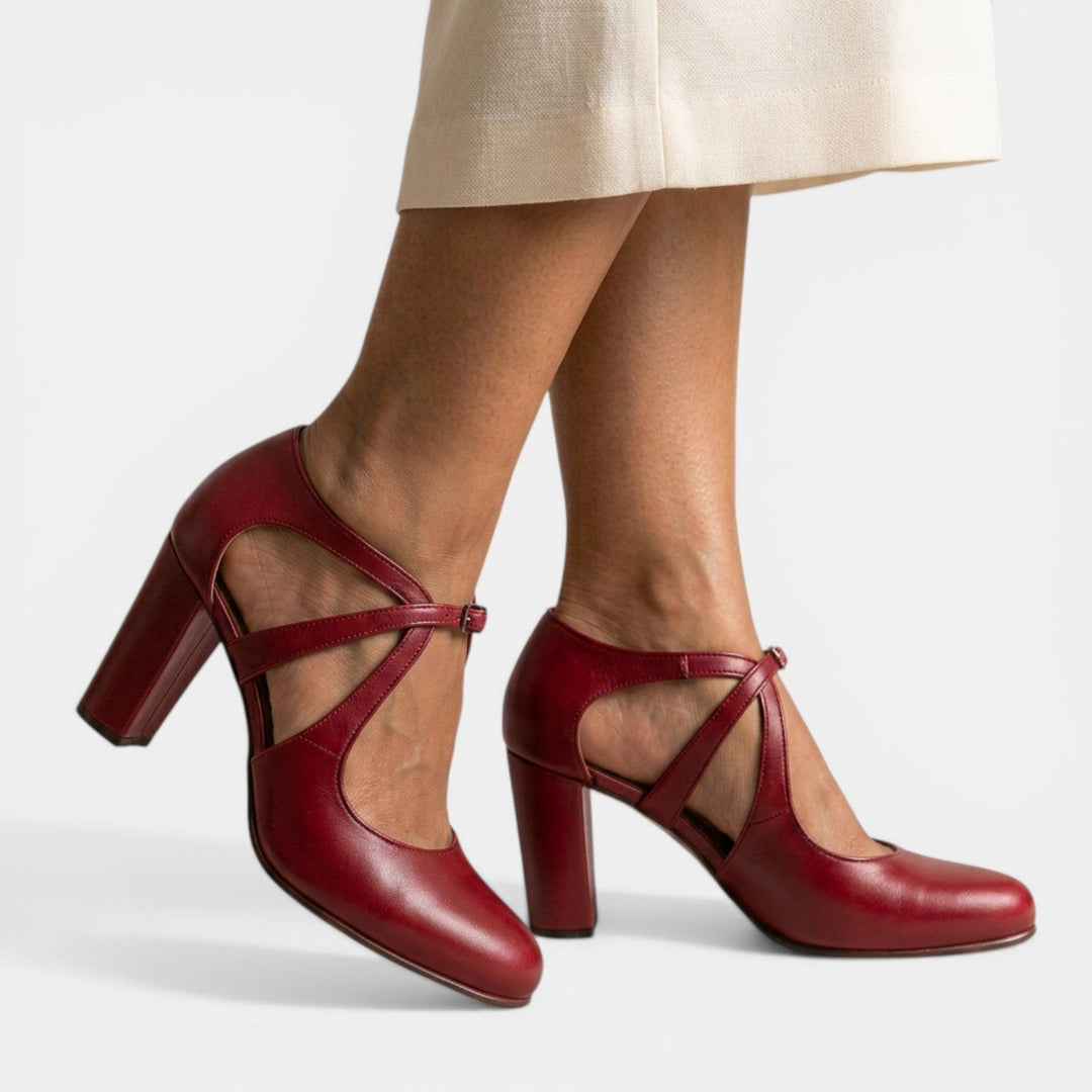 Fashionable women's T-Strap sandals, high heel design with elegant buckle closure.