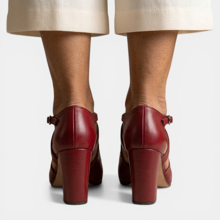 Women's evening T-Strap high heel sandals, designed with a round toe and buckle closure.