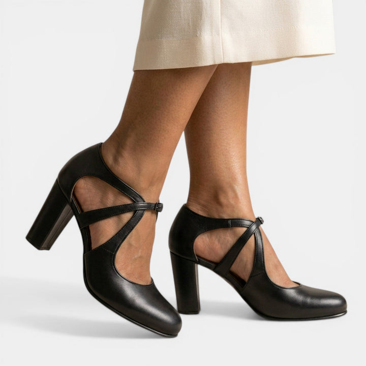 Classic women's T-Strap high heels, offering an elegant look with a durable buckle closure.