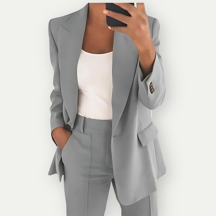 Chic women's tailored blazer and matching trousers, a versatile professional outfit for modern women.