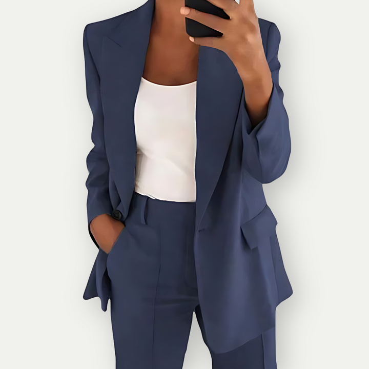 Elegant women's two-piece suit. Versatile blazer and pants set for formal wear & professional events.