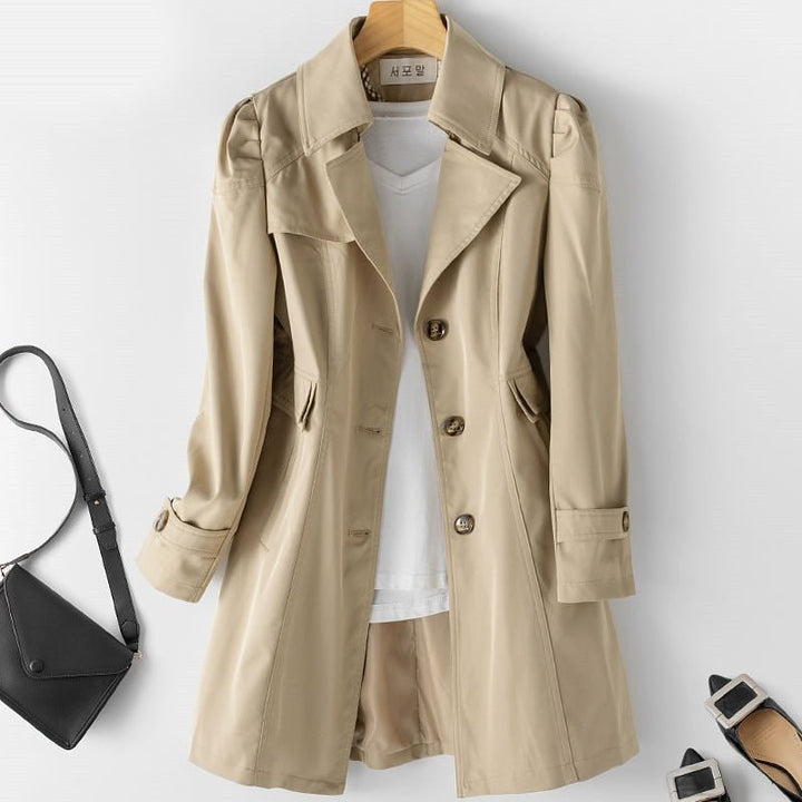 Classic women's trench coat, tailored outerwear for sophisticated office & casual looks.