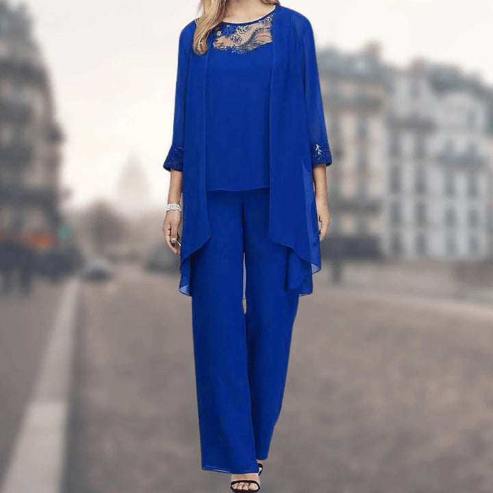 Timeless women's flowy three-piece outfit set, featuring wide leg pants & relaxed top for summer elegance.