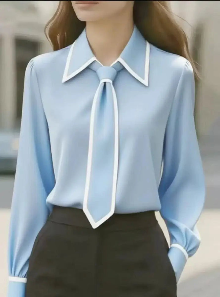 Versatile women's long-sleeve tie-neck blouse in a classic button-down style with sophisticated contrast trim.
