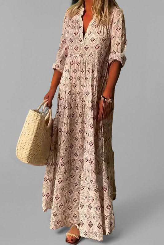 Elegant women's tiered maxi dress, perfect for summer occasions. Flowing, chic design for a sophisticated look.