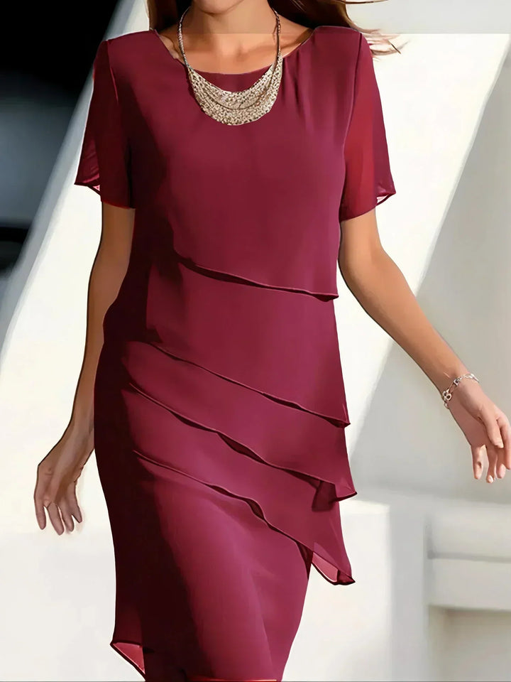Comfortable & elegant women's tiered midi dress with a flattering fit, perfect for sophisticated fashion.