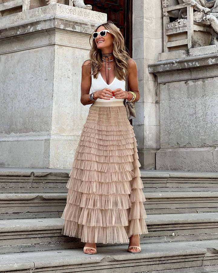 Elegant women's tiered ruffle maxi skirt for evening wear, perfect for formal occasions & special events.