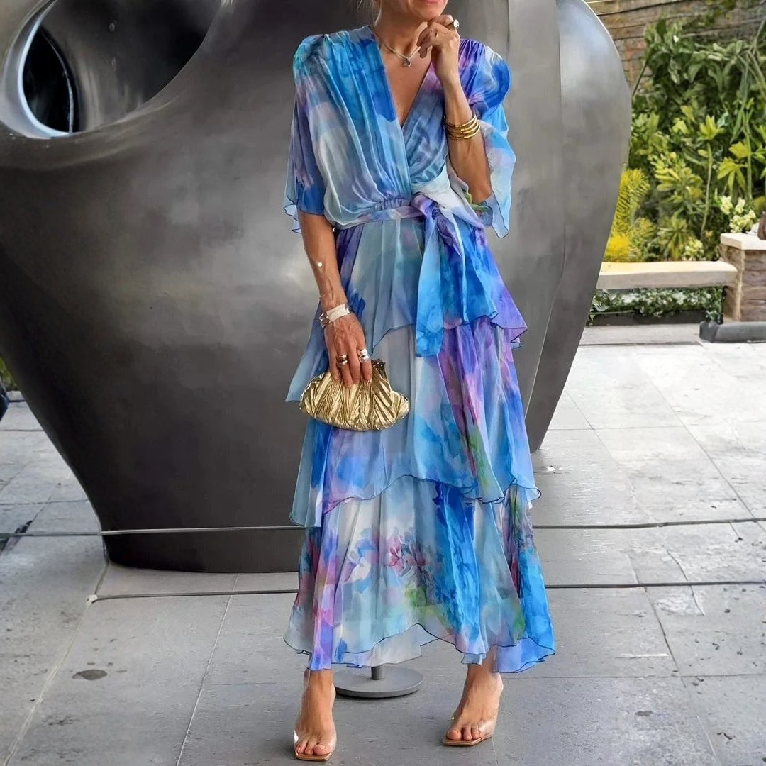Women's stylish tiered wrap dress, ideal for summer parties and sophisticated evening wear.
