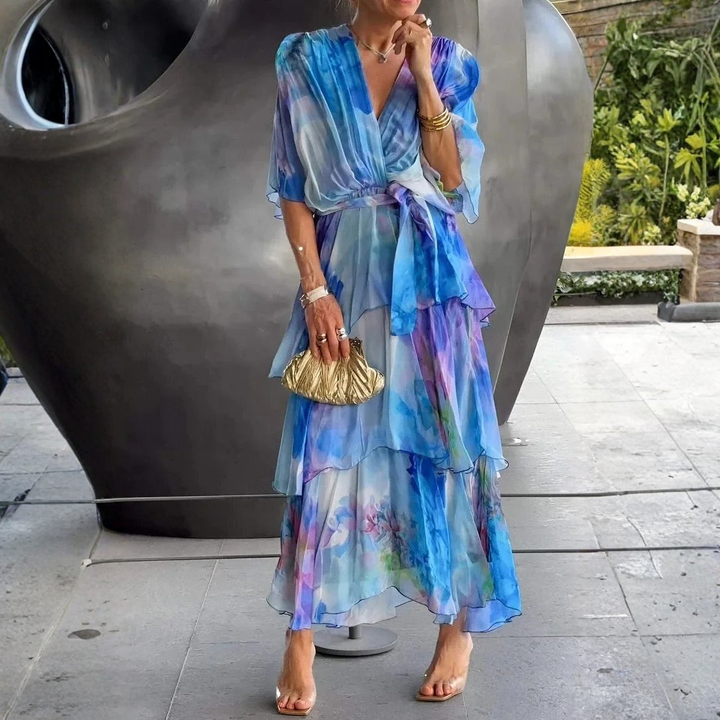 Women's stylish tiered wrap dress, ideal for summer parties and sophisticated evening wear.