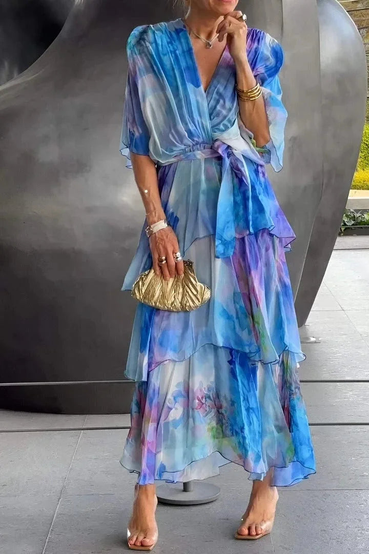 Graceful women's tiered wrap dress with flattering silhouette, suitable for galas and elegant events.