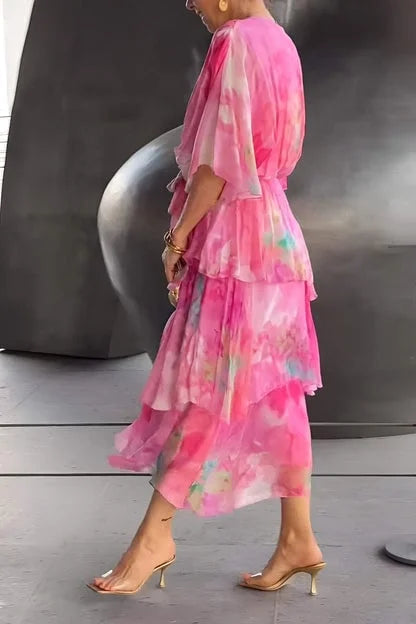 Flattering women's wrap dress, tiered design perfect for festive galas & formal evening wear.