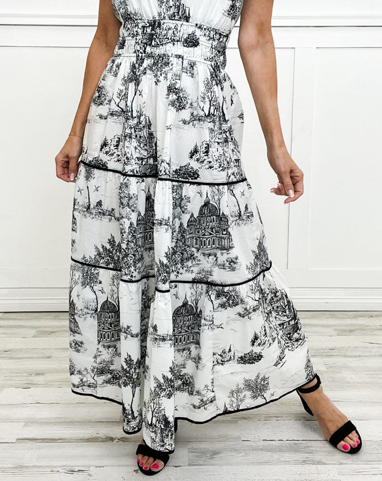 Detail of smocked waist on women's elegant toile print maxi dress, comfortable & stylish.