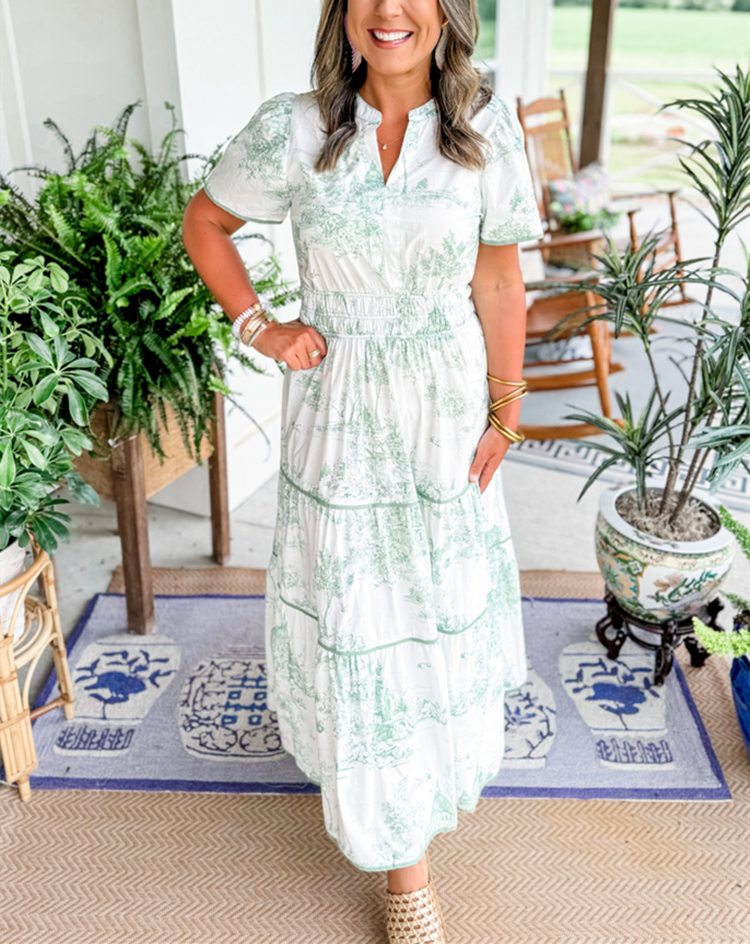 Beautiful toile print on a flowing smocked maxi dress for women, ideal for spring.