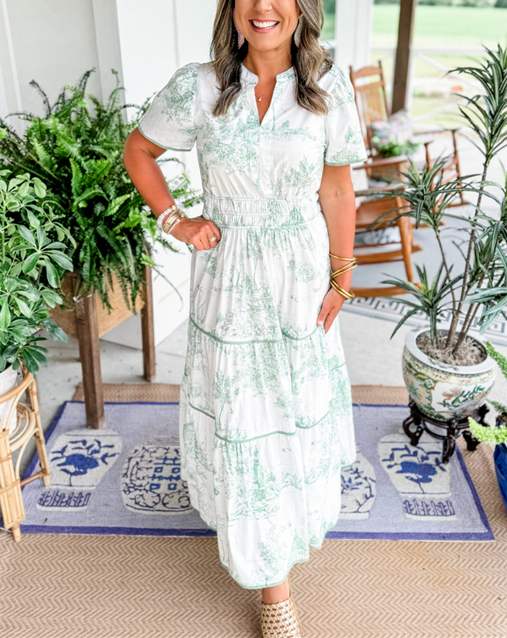 Beautiful toile print on a flowing smocked maxi dress for women, ideal for spring.