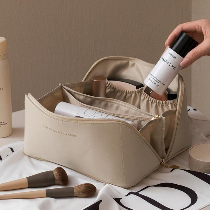 Elegant women's travel makeup organizer bag for cosmetics & beauty essentials, perfect for journeys.