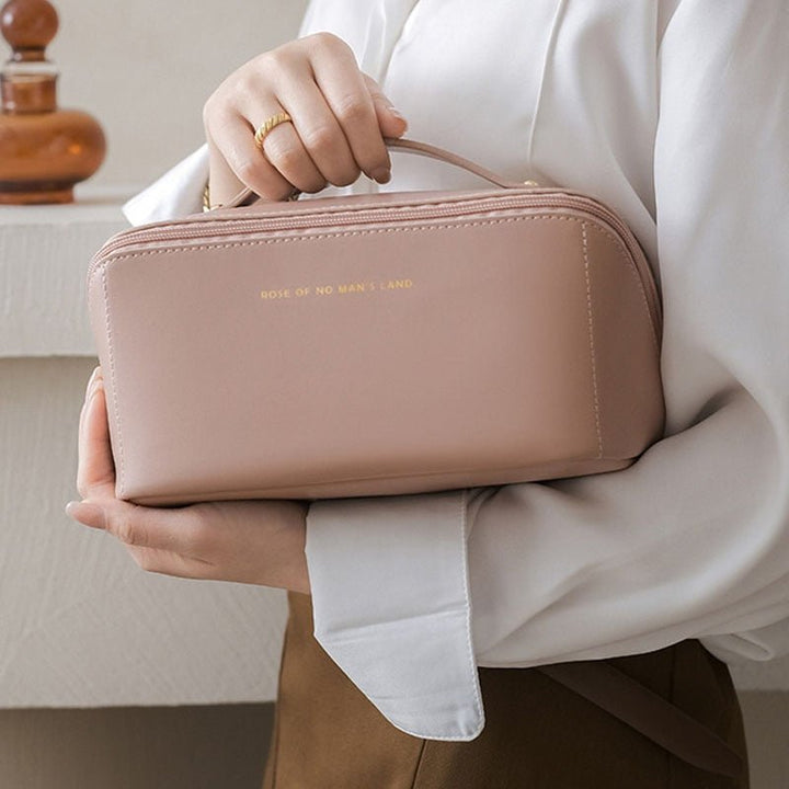 Portable makeup organizer for women, a chic travel bag to store all your beauty and daily essentials.