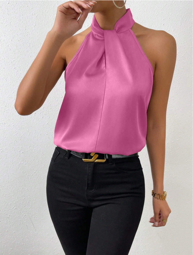 Flattering twist knot neck design on a women's short sleeve elegant top, versatile style.
