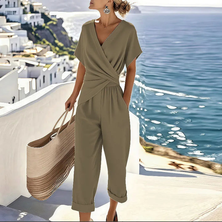 Stylish women's pants set: wrap top and tailored trousers. Comfortable & versatile for casual, elegant, or resort outfits.