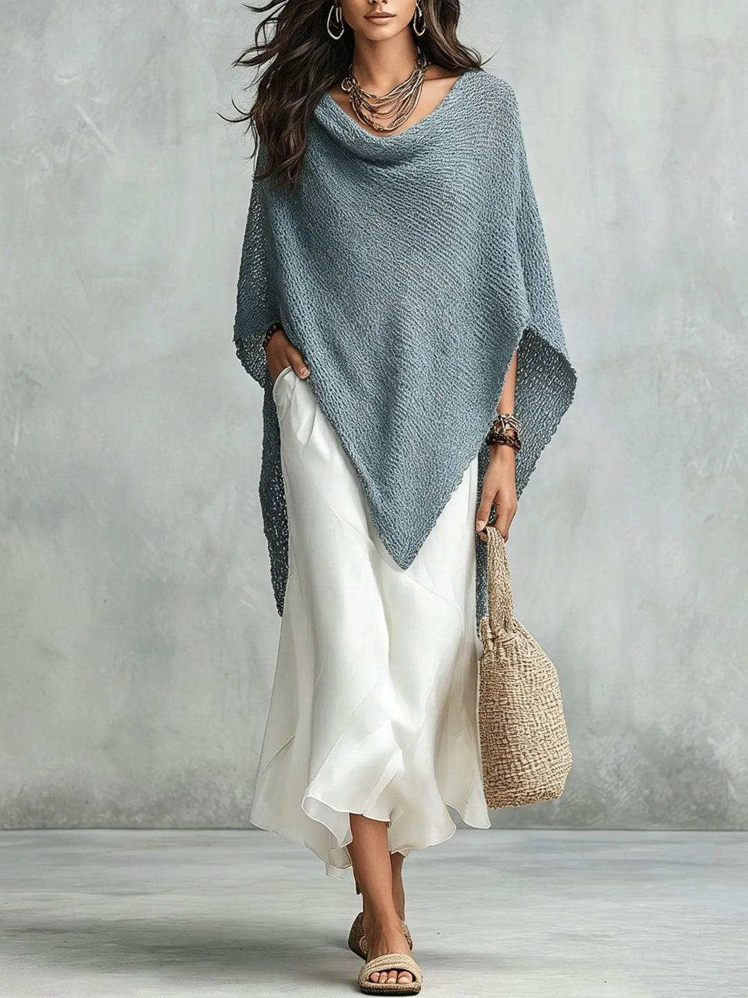 Elegant women's two-piece poncho maxi dress set. Comfortable, relaxed fit, versatile for all seasons.