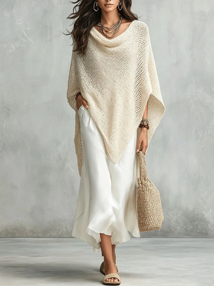 Comfortable women's two-piece maxi dress set with a relaxed fit poncho. Versatile for all-season elegant wear.