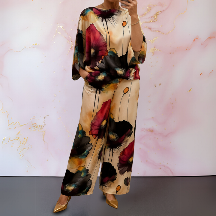Stylish women's satin two-piece set, featuring an elegant top and matching pants, perfect for formal or casual events.