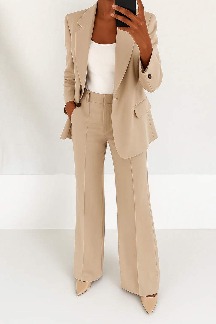 Wide-leg pants from a women's elegant two-piece suit, offering comfort and style for office or formal events.