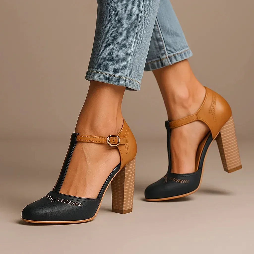 Fashionable women's two-tone block heel pumps, a modern choice for versatile everyday elegance.